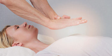 a person receiving reiki healing
